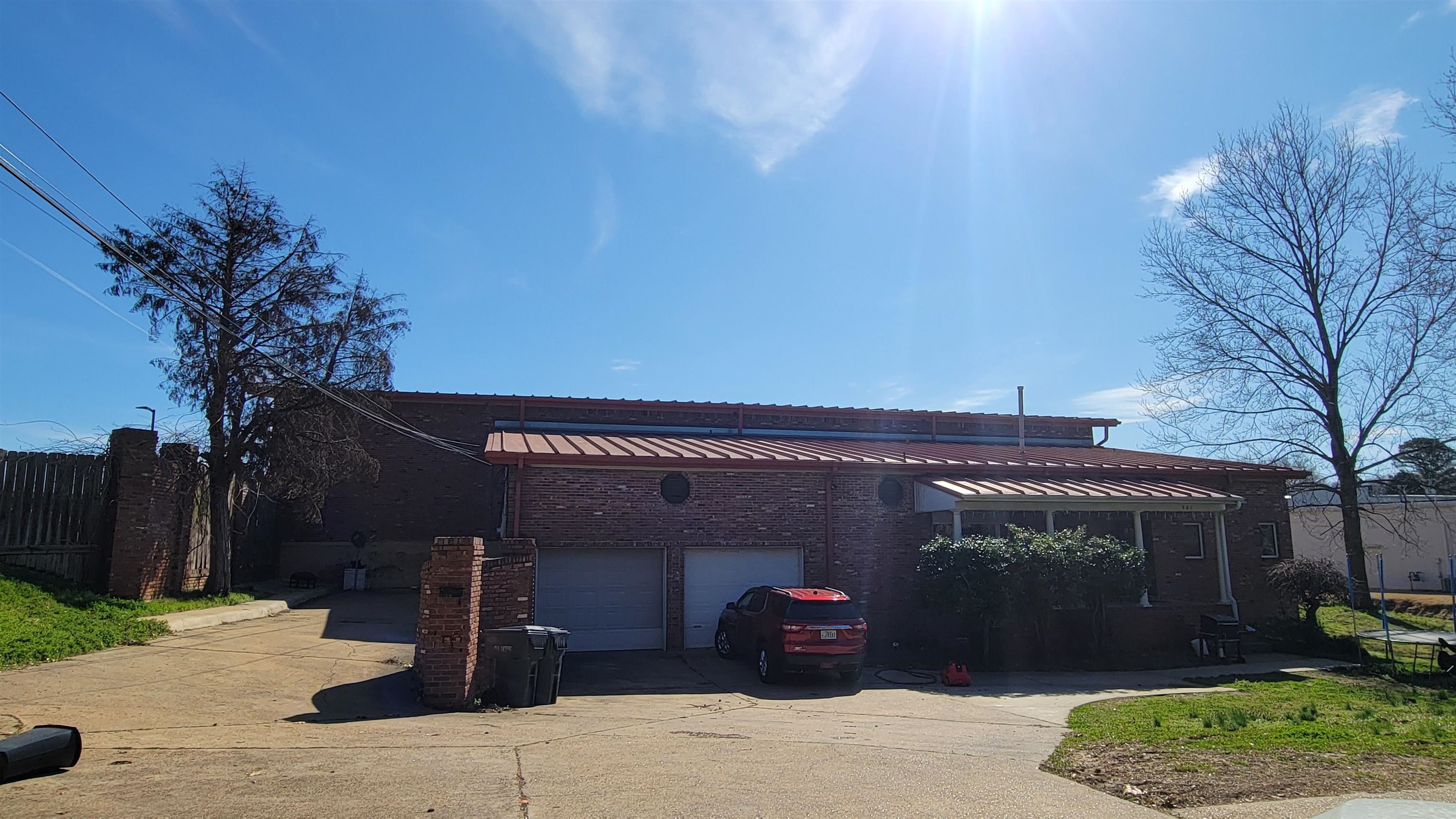 Centrally located in Jonesboro in a high visibility area. Warehouse space and two income producing apartments attached. Additional area for parking or an additional building.