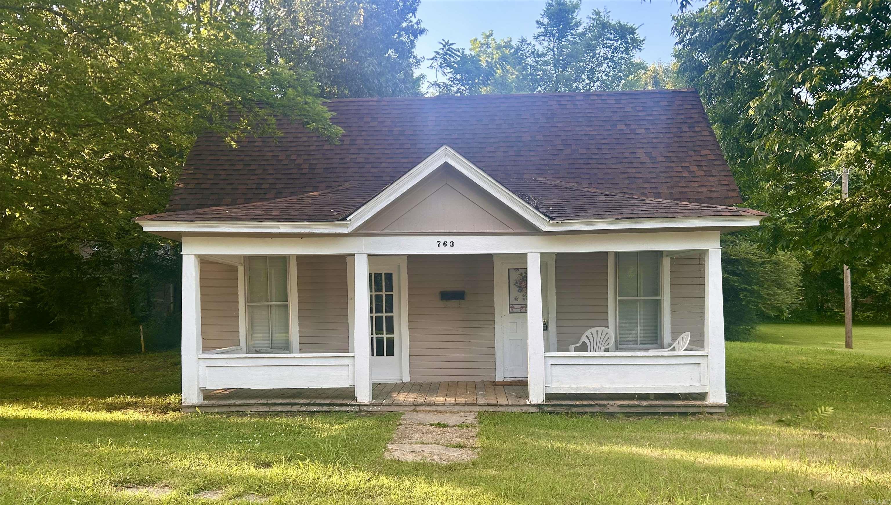 This house is perfect for a first time homebuyer, or a seasoned homeowner looking for affordability, as well as providing potential for an affordable investment opportunity. Located on a quiet street within walking distance to the town square, this homeās classic lines and good solid bones are something to work with. Donāt let this property slip away!