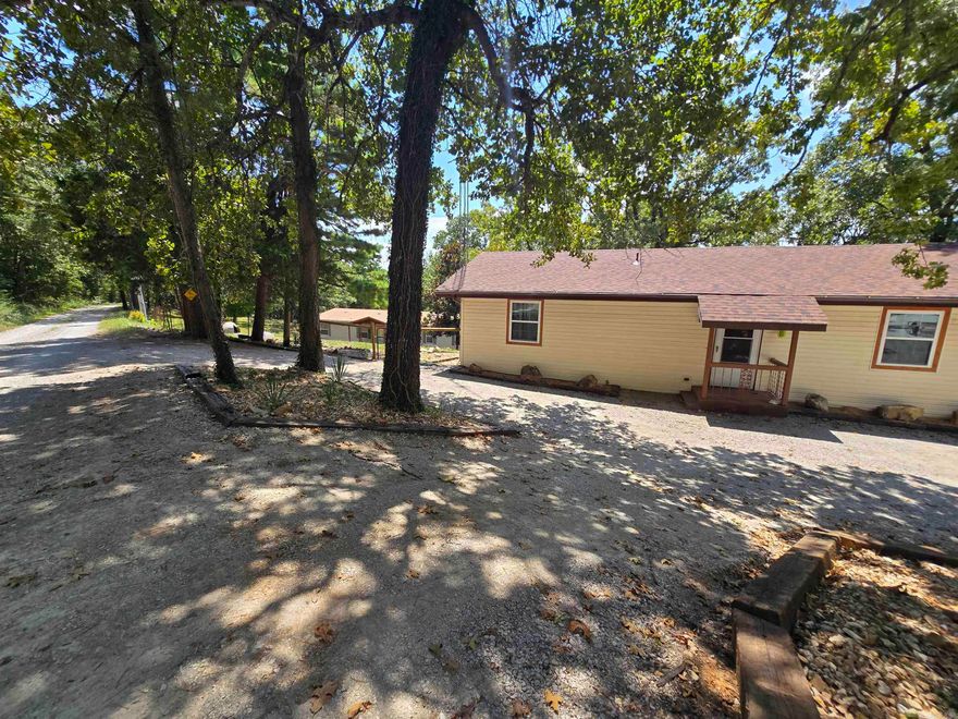 Two homes on nearly 7 acres! The charming main home features 3 bedrooms, 2 bathrooms, a partial basement, and a workshop—plus a screened-in porch overlooking the spacious backyard. The guest home is a 4-bed, 2-bath manufactured home on a permanent foundation, perfect for extended family, rental income, or extra space. Enjoy peaceful country living with modern updates, including a brand-new well and a roof that's less than a year old. The 6.98-acre property offers privacy, open space, and endless potential for gardening, hobbies, or outdoor fun. Located near Lake Norfork and Pigeon Creek for boating, fishing, and recreation. This is an ideal setup for multi-generational living or investment opportunities. Don't miss this rare find—two homes, acreage, and natural beauty for just $449,999!