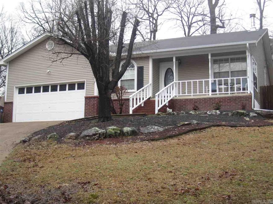 Great location! Sitting on a nice lot in town. Great floor plan with wood burning fireplace, wood flooring in Living Area, tile in the kitchen, 2 full bathrooms, laundry area, tall vaulted ceilings, great galley kitchen. Huge bonus room that can be used in several different ways, fenced backyard. Great front porch to enjoy