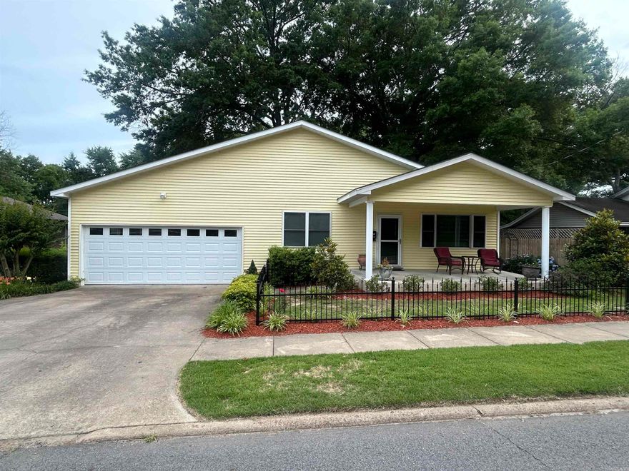 WOW!  check out this nice home in the center of town and close to everything.  This is a 4 bedroom, 2 bath home that has been recently updated.  Check associated docs for a detail update list of things done.  The over sized garage has another 400 sq ft that is heated and cooled and included in the 2288 square footage that the seller uses as his work space.  There is abundant landscaping and wrought iron fence in the front.  The backyard yard is picturesque and has a large storage building that stays.  Lots of storage throughout the home and garage.  The garage and work room are all insulated in the walls and ceiling.  Come check it out!  Agents - see remarks.