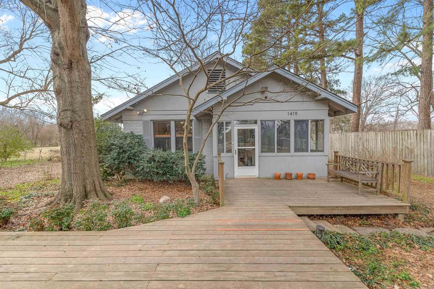 Ever dreamt of your own homestead minutes from the city? This picture perfect 2 bed/1.5 bath cottage on 5 acres IS IT!! Incredible windows, trim, original hardwood flooring. **Think Joanna Gaines!!** Enjoy the property by relaxing on the screened in sunroom, or spacious front or back deck! Updated electrical, new HVAC, new gas stove, heat pump, new water heater, newly renovated bathroom, and ample storage. The charm of an older home with modern updates! This property is a hobby farmers dream! Set up with 3 wells, irrigation system, scattered outlets, private 26 ft deep clear soft water table, fencing, fertile soil, and fig trees etc. All framed out with a beautiful iron fence with new automated gate! The owner filled a TWO PAGE document listing all the updates and renovations. You don't want to miss this! * Washer/Dryer and Refrigerator convey!