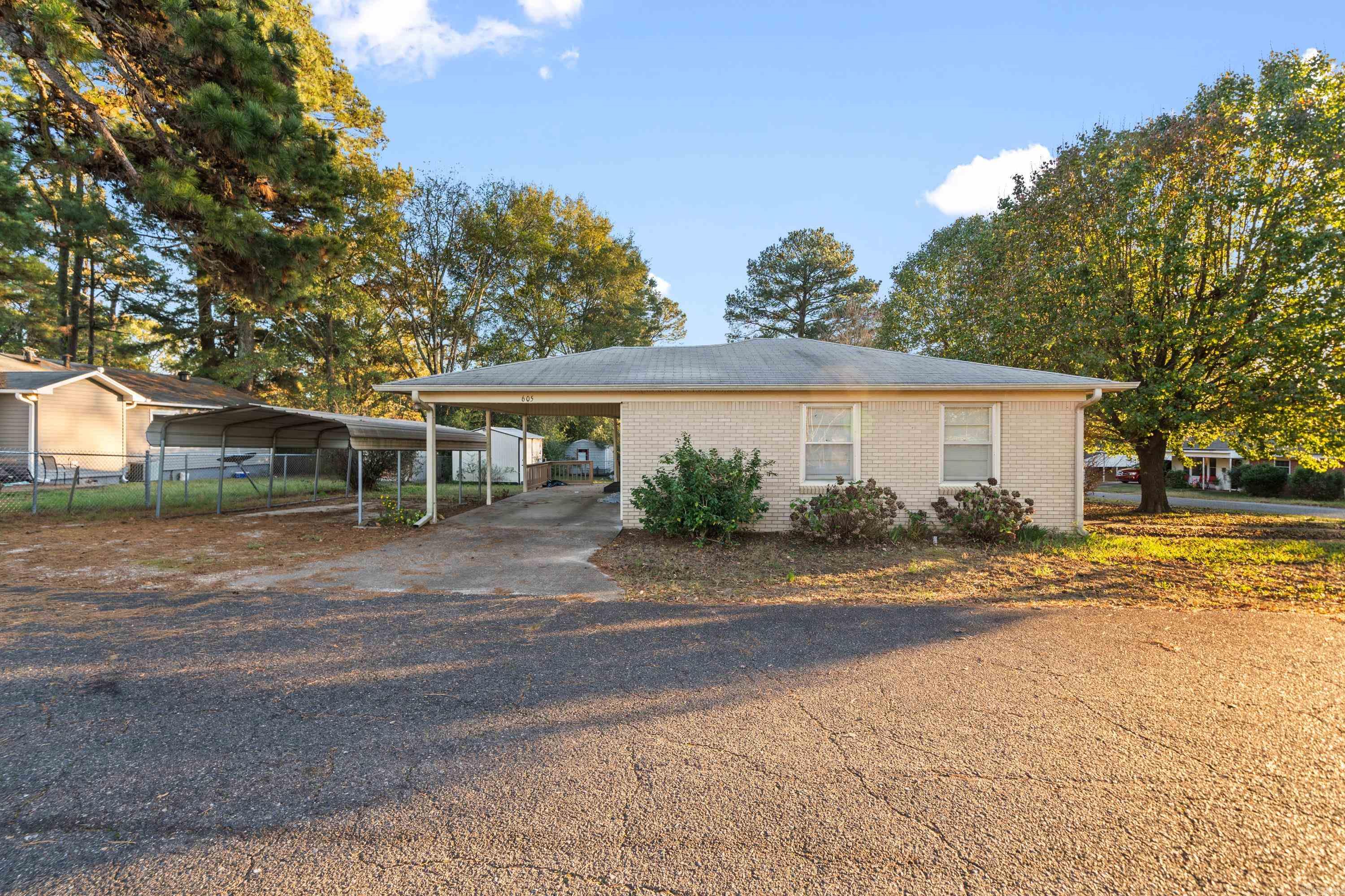 Come see this adorable brick home with three bedrooms and one and a half bath, both convenient and centrally located in Malvern. It has been very well maintained and ready for new ownership. H/A replaced in 2023 and the roof is only 7 years old. You will love the antique stove where you can push a button to hide the burners for sleek storage when not in use. For the restoration enthusiast, the carpets in living room, hallways and bedrooms cover the original hardwood floors! The home has plenty of storage inside and out while the den features custom built in shelving for interior displays. The home has 3 designated parking areas, two that are covered and will be a must see.