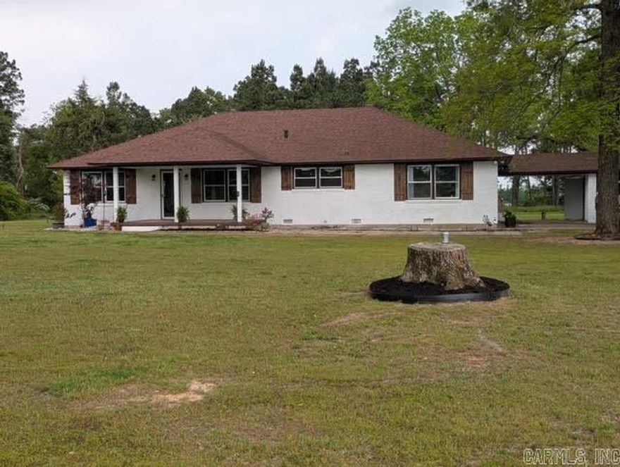 Welcome to your private retreat in the heart of southwest Arkansas! Nestled on 5 beautiful acres just minutes from downtown Prescott, this property offers the perfect blend of peaceful rural living and convenient access to local amenities.  The home features 3 spacious bedrooms and 2 updated bathrooms, a large open-concept living area, and a cozy kitchen with plenty of cabinet space and modern appliances. Whether you’re relaxing on the front porch or entertaining in the backyard, you’ll love the views of open fields, mature trees, and the natural beauty that surrounds you.  Outside, there’s ample room for a garden, livestock. With no restrictions and plenty of space to roam, this property is ideal for anyone seeking a homestead, hobby farm, or simply a quiet place to call home.  Additional features include a detached garage/workshop, and easy access to I-30 for commuting or travel.  Don’t miss this rare opportunity to own a slice of Arkansas countryside!