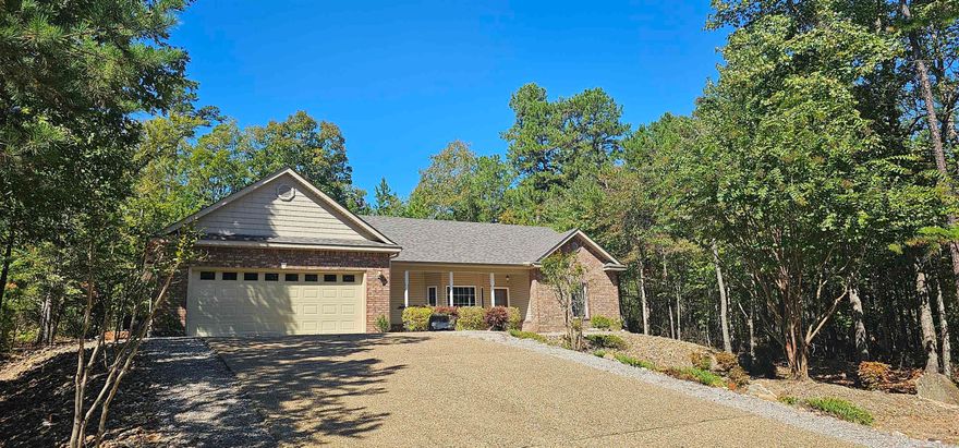 Everything is new! Freshly painted inside, appliances new, carpet, roof.  All one level secluded yet close to golf course and other homes. Fireplace plumbed for gas, covered patio, split bedrooms, open kitchen to dining and living area. Brick and Vinyl Exterior. Approx. 1897 sq. ft h/c, built in 2009. $285,000