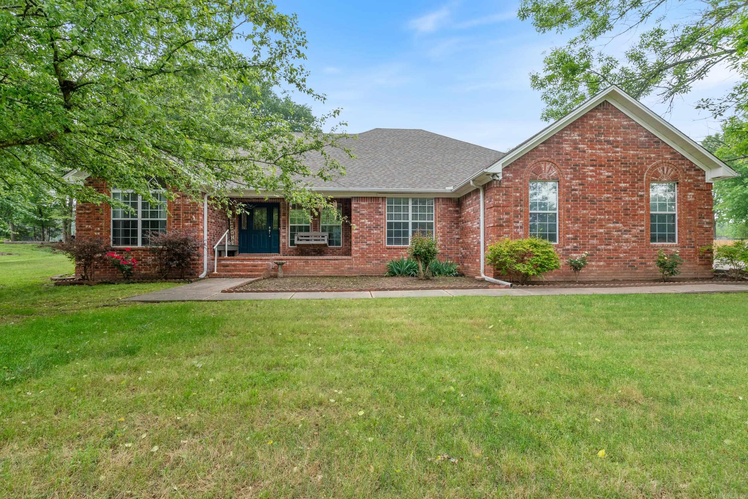 Very well maintained home in Wooster. This 4 bed/2 bath home sits on .83 acres. You'll love the large living room with detailed tray ceilings as well as second living room on the back of the house with gas log fireplace. The eat in kitchen is has so much storage and counter space making it a perfect place to entertain! This home has a split floor plan with the Primary bedroom on one side that is large enough to fit an additional seating area! Adjoining primary bathroom offers two closets, soaking tub, walk in shower, and private toilet. Laundry room can be found right outside the Primary bedroom. Two other bedrooms on opposite side of house with a full bathroom in between. Fourth bedroom is off of the living room and has great natural light and closet space. You'll also find a fully enclosed glass porch perfect for relaxing! Exterior includes a front porch and swing, extra one car garage perfect for a man cave, extra storage, or she shed and you'll find an additional storage shed as well. Mature trees and a tree house top off this incredible home!