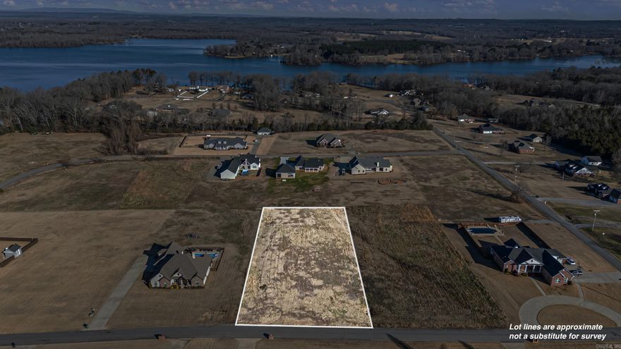 Build your dream home on this 1.2± acre lot located in the highly sought-after Woodlands Subdivision, just outside of Morrilton, Arkansas. This beautiful property offers the perfect blend of privacy and convenience, with a peaceful, wooded setting while remaining just minutes from town amenities, schools, and shopping. Enjoy the space and flexibility that larger acreage provides, all within an established neighborhood known for its attractive homes and quiet surroundings. Utilities available at the road (buyer to verify). Don’t miss this rare opportunity to own a premium lot in one of the area’s most desirable subdivisions!