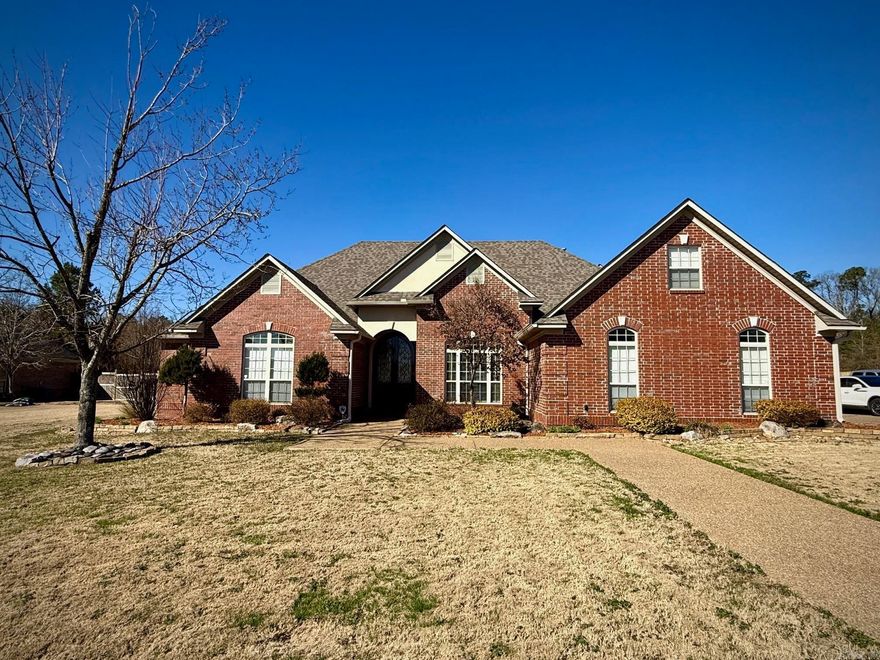 Experience comfort, flexibility, and timeless design in this exceptional 4-bedroom, 3.5-bath home located in the highly sought-after WestWinds gated community. Thoughtfully constructed with quality craftsmanship throughout, this home showcases soaring ceilings, elegant finishes, and a layout designed for both everyday living and entertaining. Two spacious family rooms offer incredible versatility and can be ideal for multi-generational living, a private guest retreat, or expanded entertaining space. The 5th bedroom, currently an office provides the perfect work-from-home setup. Step outside to your own private oasis. Enjoy the covered patios, stunning gunite pool complete with a fountain, outdoor fireplace, all within the privacy fenced back yard. This home is designed for year-round enjoyment.Residents of West Winds enjoy exclusive lake access and a private boat ramp, making it easy to embrace the lake lifestyle whenever you choose. Select furnishings may convey with an acceptable offer -inquire for details. This is luxury, space, and lifestyle all in one address. Schedule your private tour today.