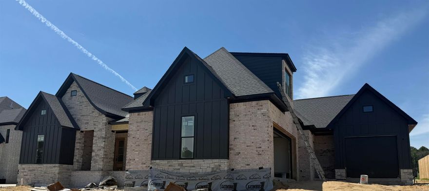 Stunning new construction home with modern finishes! Will be completed by June 2026, this home has so much to offer. Gold fixtures on the inside, luxury tile flooring and showers throughout, stained beams and accents, custom shelving and cabinetry. A few selections can still be made to make it YOURS!