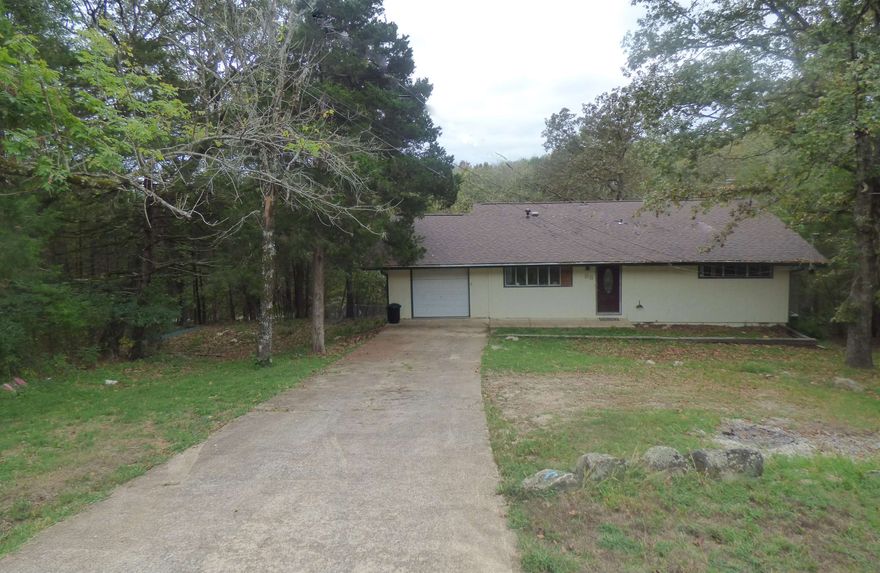 Tri-Level house in a private location. This house has, 2 baths, 2 fireplaces, wood floors, large open living room and a spacious kitchen. The house has a nice covered deck, one-car garage, NEW ROOF , NEW ELECTRIC WIRING, plenty of space in the backyard plus there is an extra lot that would make a good spot for a detached shop/garage. there is privacy with no one right next to you and you are not far from the South Fork River or the North Golf Course.