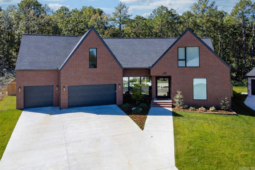 This stunning home built in 2023 blends traditional architecture with contemporary style and an open concept design. Huge windows along the back overlook a beautiful backyard with an inground saltwater pool, covered patios, an outdoor kitchen, pool bath, and multiple areas for entertaining. Inside, the floor plan is thoughtful and functional, with gorgeous flooring throughout. The fabulous kitchen features a gas range plus wall oven, two dishwashers, wonderful beverage center, and an oversized pantry. A large laundry room adds convenience. The exceptional primary suite offers a spa like bath and an impressive closet. A guest ensuite and powder bath is also located on the main level. Striking floating staircase leads to the second floor with two additional ensuite bedrooms plus a fifth bedroom with its own bath that could serve as an office. The upstairs also includes a huge bonus/game room and a spacious family room ideal for TV or play. With so many options and too many amenities to list, this home is designed for comfort and versatility. An oversized 3 car garage completes the property.  Come see.