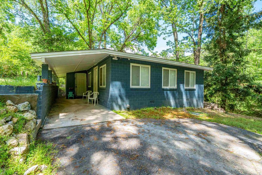 Secluded Oasis Just Minutes From Downtown!  On nearly an acre with no visual neighbors, this fully updated home offers total privacy just a mile from downtown. Enjoy modern finishes, LED mirrors, and lush landscaping with blooming wisteria. Unwind in the luxurious 70-inch freestanding tub for two. A rare, peaceful retreat close to everything.