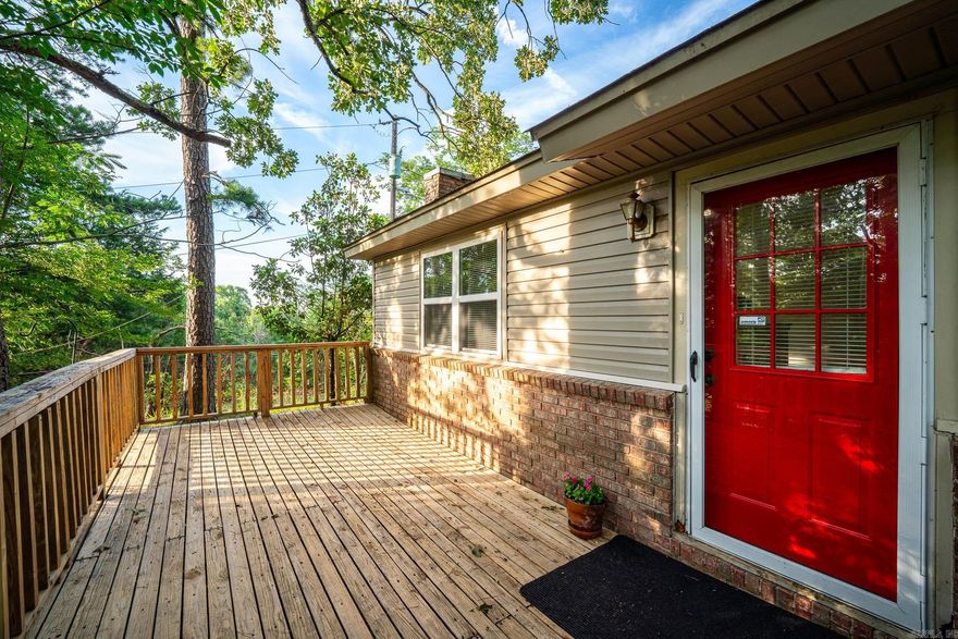 Nestled in the picturesque countryside of Benton, Arkansas, this delightful 3-bedroom, 2-bath home offers the perfect blend of serene country living and modern convenience. Located close to top-rated schools and exciting new developments, this property is a gem you won't want to miss. Situated on almost an acre of land atop a hill, this home provides breathtaking views of Saline County and the majestic Chenal Mountain. Enjoy your morning coffee or evening sunsets from the comfort of your own back yard. Inside, you'll find plenty of space, with recently painted interiors that give the home a fresh, modern feel. The luxurious jet tub in the bathroom is perfect for relaxing after a long day. The back of the house features a charming sunroom, allowing you to soak in the beauty of the surrounding landscape year-round. Additional features include two nice storage sheds that convey with the property, offering convenient and ample storage space. This charming country home won't last long at this price. Schedule your viewing today and make this slice of paradise yours! Agents see remarks!!