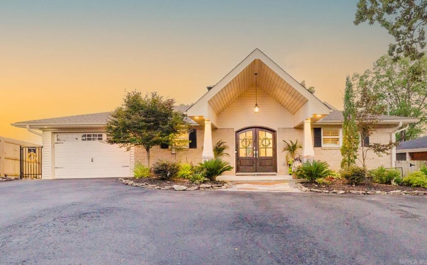 This beautifully updated 4-bedroom, 3-bath home offers 2,700 square feet of spacious, comfortable living, thoughtfully designed across two levels. Recently upgraded with brand-new windows, exterior doors, and a new roof, the home provides modern efficiency and peace of mind. The entry-level welcomes you with an open-concept layout featuring two large bedrooms and two full baths, ideal for main-level living. The kitchen and main living area flow seamlessly, filled with natural light from the new windows. Downstairs, you'll find a fully finished lower level that includes two additional bedrooms, a full bath, and a second kitchen and living room — perfect for extended family, or even a private rental suite.  Step outside to your personal backyard oasis, where a new liner has been installed in the in-ground pool, ensuring seasons of fun and relaxation. A luxurious hot tub is also included, offering a soothing retreat any time of year. The fresh landscaping enhances the curb appeal and backyard ambiance, creating a lush, welcoming environment. For water enthusiasts, the property features a 2 Stall boat dock with lifts, making lake access and boat storage effortless. year round water.