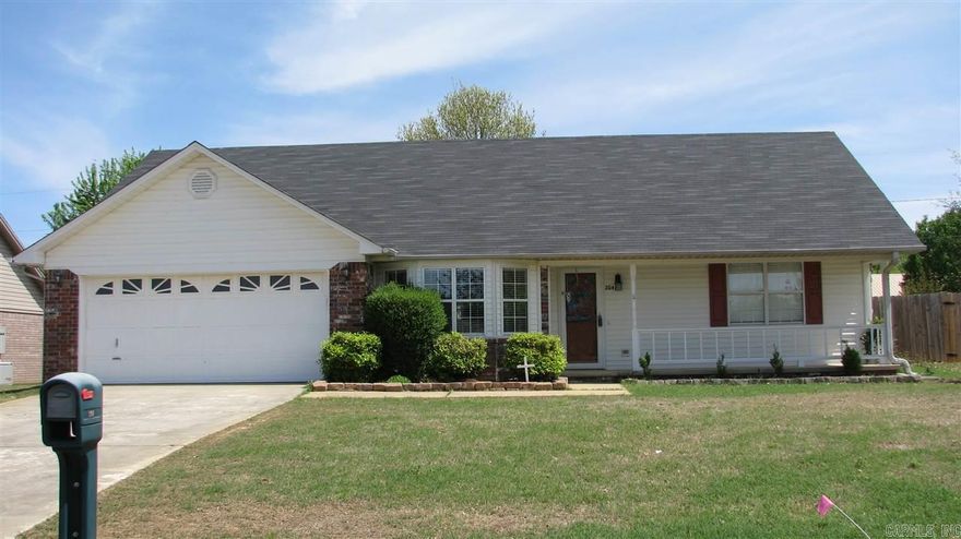 Adorable home and move in ready ! Laminate and tile flooring throughout.  Fun and updated paint colors.  Master bedroom is separate with walk in closet.  Vaulted ceiling in  living room.  Electric range and dishwasher are approximately 2 years old. Nice bay window in dinning area that allows plenty of natural light.  Easy floor plan for good traffic flow. All bedrooms have good size closets, nice storage closet in hall bathroom too. Privacy fenced backyard with covered patio.