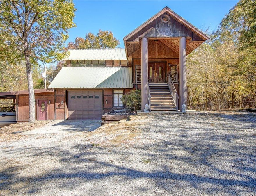 Two full acres MOL of privacy on this Woodview Lane property. With black wrought iron fencing and a security gate with remote control this home would be a great place for a family. It's just a short trip on Sunshine Rd over to Lake Hamilton School. There's a Tiki hut in place.  Great area to relax and enjoy your surroundings. The 3 bedroom / 3 bathroom steel beam structured home is waiting for a new personal touch from new owners. This place was built to last! The north side of the home has a covered boat storage area and the Beau Reaves unrecorded subdivision has a boat launch area for the neighborhood. If you need extra storage there's a 100 sq ft wooden storage building in place. There's actually another home site on the property if needed. Lot is still recorded as 4.3 MOL and will need new survey for this South side of Woodview Lane.  This could be a great site for multiple VRBO nightly rentals.   Good spot for Biker Rally as well.  Single car garage and plenty of parking outside in front of the home.  One bedroom downstairs is accessed through door inside the garage.  Teenagers dream private room.