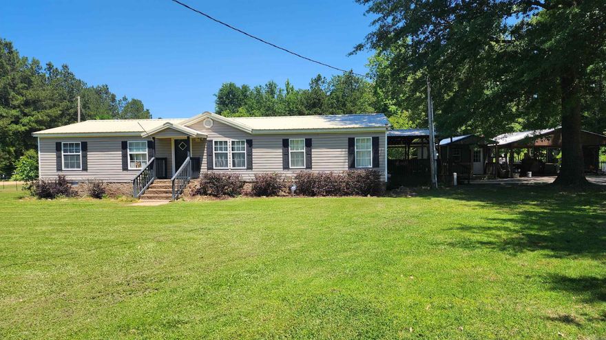 If you are looking for quiet country living with room for all of your tools, equipment, and animals then this is your chance.  This property has a shop, above ground pool, and a large fenced in area for your animals.  It is located close to the Woodlawn school, store, fuel, ATM, and Dollar General. Take a look before it's gone!