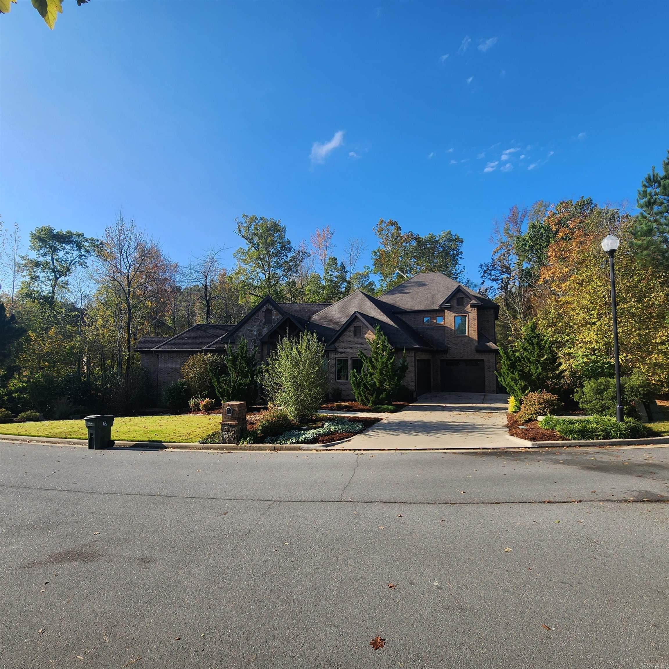 SOLD BEFORE LISTED! Beautiful detailing and layout. Primary and Guest suites on main level. Situated by green belt on 3 sides with beautiful creek view out the back.
