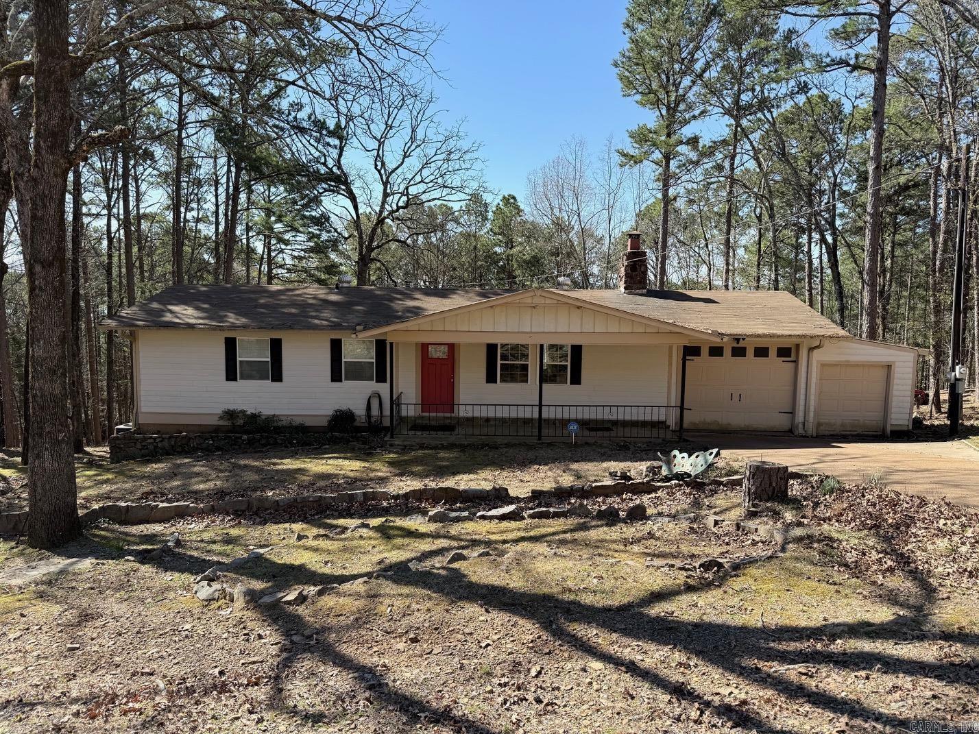 Check out this adorable FURNISHED lake house! Located less than one mile from Fairfield Bay Marina. An airy floor plan that seamlessly connects the living, dining, kitchen and sunroom, making it perfect for entertaining. Enjoy a partial lake view from the upper or lower decks. Outdoor fire pit perfect to savor lake life. Bonus room downstairs that could be used as an additional bedroom or storage! Fairfield Bay provides 3 swimming pools, golf courses, tennis, bowling and countless ATV trails! Also included with this home is and adjacent parcel on Lakeside Road to ensure even more privacy! This home has everything you need for your Happy Place! Call Today!