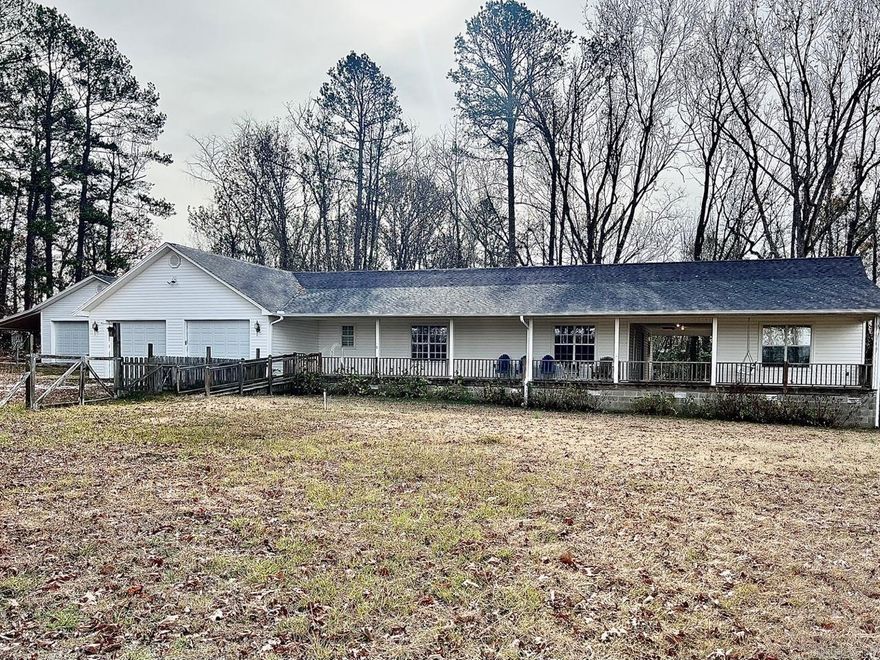 This charming property is located south of Malvern off of Vineyard Hill and offers a serene and setting. The main home features three bedrooms and one bath, with an additional one bed and one full bath in the guest house or in-law quarter, connected by a breezeway. The property sits on a spacious 5 plus-acre lot, providing ample room to enjoy the beautiful surroundings. A 28x30 detached shop with a 12x30 lean to adds practicality and convenience to this idyllic setting. Whether you're seeking a peaceful retreat or a place to call home, this property offers a perfect blend of comfort and natural beauty.