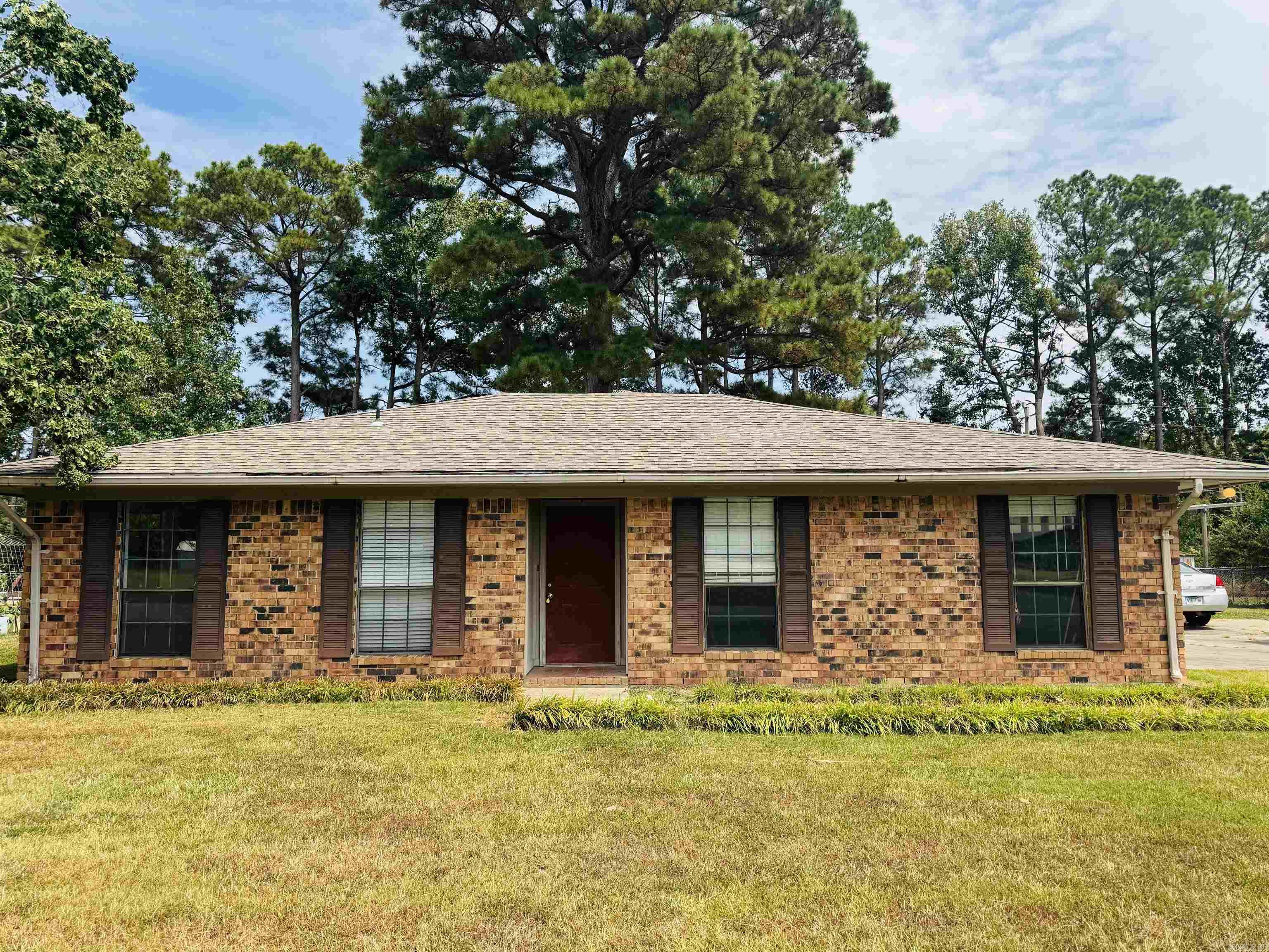 Looking for a nice place that won't break the bank? Check out this all brick 3 bedroom 2 bath on highly desirable Scenic drive! Located only 2 minutes from the freeway makes this home an easy commute to everything... Offering a very practical layout thats overly welcoming and great for entertaining guests. As you walk in your greeted with an oversized living area with a wood burning fire place as center of attention. Kitchen and dining room situated perfectly for an open concept from living area. Master bedroom is nice sized, and offers a walk in closet with plenty of room for storage. Walk out to your concrete patio just off of the living area to a fenced in back yard with a storage shed as a bonus. This home is move in ready and not to mention has a nice sized garage as well. Book your showing today because this one checks all the boxes!