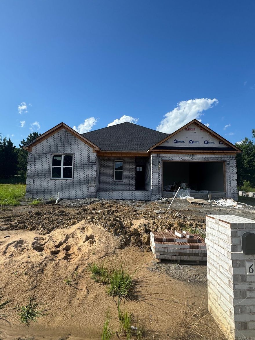 Welcome to this stunning new construction all-brick home, perfectly blending modern elegance with comfort. This 4-bedroom, 2-bathroom beauty features spacious rooms and an open floor plan that’s perfect for both everyday living and entertaining. Each of the generously sized bedrooms boasts large closets, providing ample storage for all your needs. The luxury primary suite is a true retreat, offering a spa-like atmosphere with a large soaking tub and a custom-tiled walk-in shower—perfect for unwinding after a long day. The home is bathed in tons of natural light, highlighting the modern colors and high-end finishes throughout, from the standout accent walls to the spacious quartz-topped kitchen island that is sure to be the heart of the home. Seller offering $5,000 in buyer concessions!! Schedule your tour today!