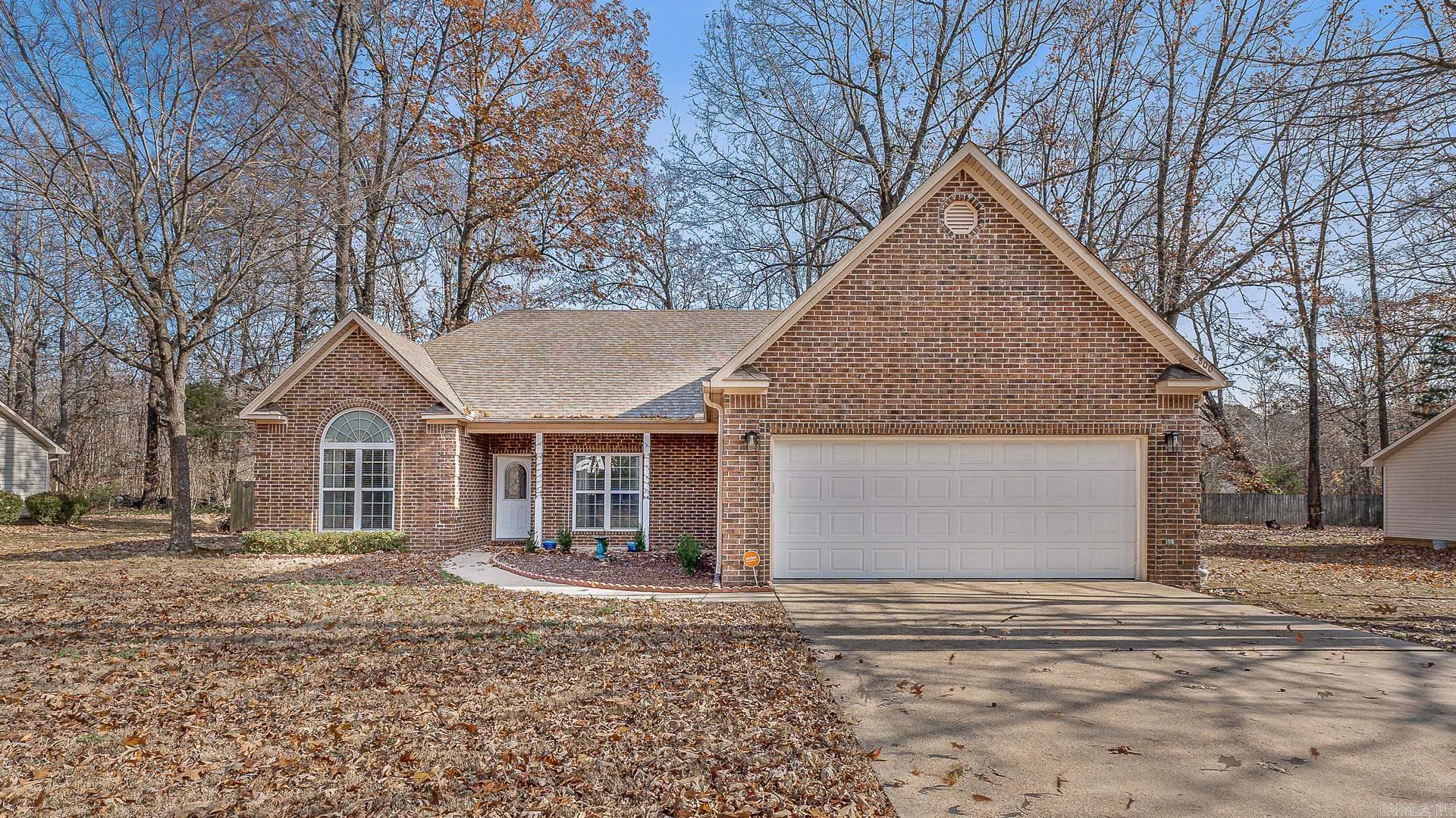 This charming home features 3 bedrooms, 2 bathrooms, including a spacious primary bedroom. Enjoy the privacy of a fenced backyard with a storage shed. The refrigerator stays and there's a cozy front porch plus a separate laundry area. Perfect for comfortable living.