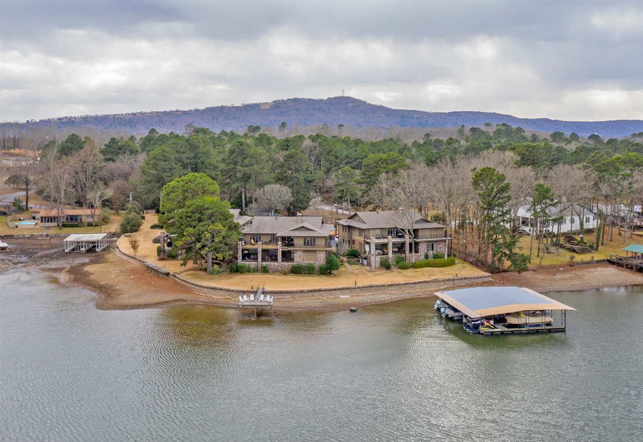 RARE OPPORTUNITY TO OWN A SHADOW HILL CONDO!!! This amazing unit is centrally located in an exclusive, 6 unit regime, with a commanding view of Lake Hamilton!!! Enjoy all the holiday fireworks from your spacious balcony