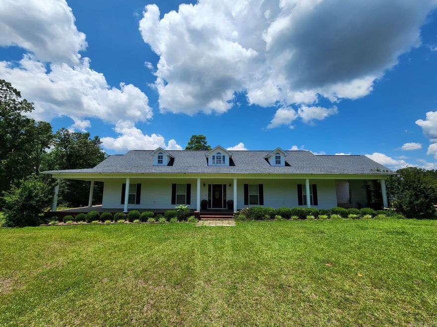 Beautiful 3 bedroom 2 bath home sitting on 10 acres of green pasture!
