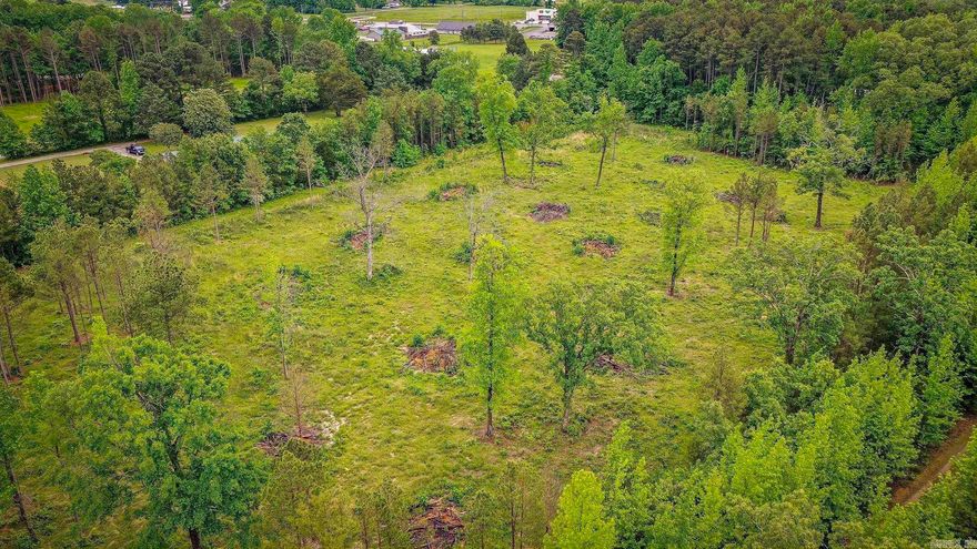 8.54 acres located less than a mile from the lake! Located in the middle of Greers Ferry, this property could be used for a single-family home or to build a family retreat or subdivision secluded by trees with the quiet sounds of nature surrounding you! A small pond allows for fishing, and plenty of deer! You will be located within 2 miles of Shiloh Marina, Lacey's Marina, and Devils Fork Park. Taxes are unknown, as this is part of a 30-acre tract. Some photos have been computer-altered to show you the potential of this great tract of land! Call to see today!