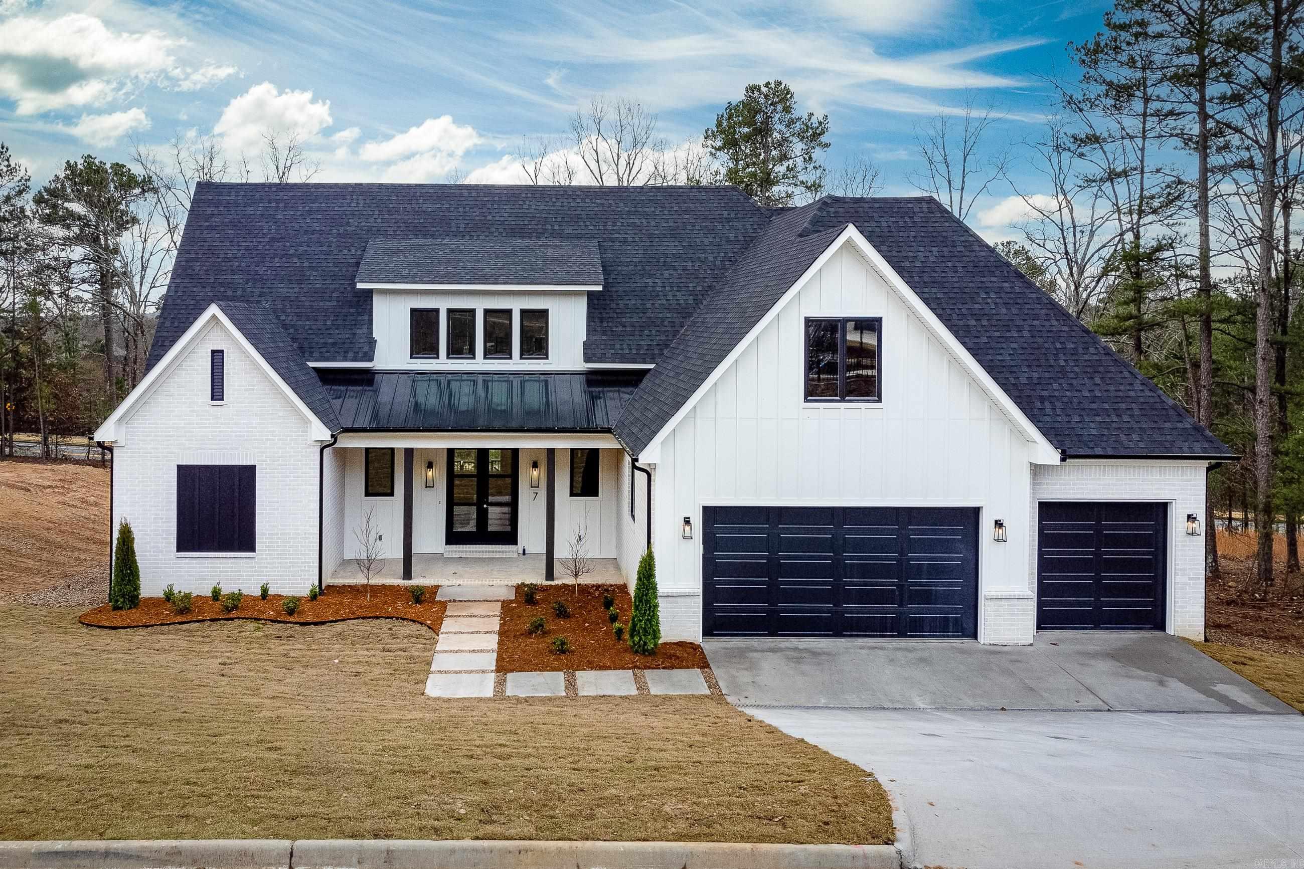 Back on Market through no fault of seller or home! New construction located in Bear Den Estates on Chenal Mountain, this 5-bed, 4-bath, 4104 sf transitional home is loaded with beautiful features and space for everyone & everything. On the main level, the large primary suite is adjacent to the office. A 2nd bedroom with ensuite bathroom is also located on the first floor. Entertain with style! The kitchen is loaded with storage space, beautiful countertops and backsplash. Equipped with top-of-the-line appliances and prep kitchen, it's a culinary enthusiast's dream! The expansive pantry ensures space for your kitchen essentials. A 3-car garage has added storage space. Upstairs, a lounge AND bonus room are well suited for family movie/game night, crafting or working out. Additional laundry connections upstairs makes this chore easier. Bear Den Estates is commitment to preserving nature and provides private trails of Bear Den Wildlife Reserve. Embark on rugged bike trails, serene hikes or nature walks right from your doorstep. This home is conveniently situated across from the playground, trailhead and mailboxes. Annual Taxes are based on lot only. Please see agent remarks.