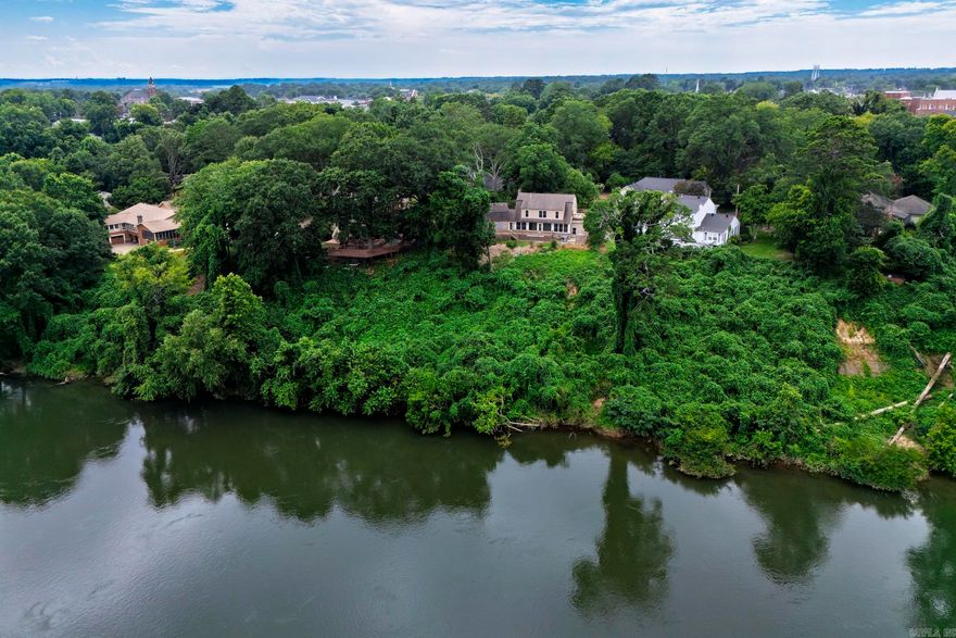 A Rare Offering on Riverside Drive — 4 Bedrooms • 2.5 Baths • Ouachita Riverfront  Homes on Riverside Drive rarely come on the market, making this a unique opportunity to own a beautiful riverfront property in one of the most sought-after locations. This 4-bedroom, 2.5-bathroom home offers incredible Ouachita River views from nearly every room at the back of the house, along with a stunning sunroom that runs much of its length.  Inside, the kitchen has been thoughtfully updated with custom cabinetry, granite countertops, and a convenient butler’s pantry. The primary bathroom has also been beautifully renovated, combining modern comfort with timeless style.  Located in the historic Riverside neighborhood, this home offers a perfect balance of character, updates, and unbeatable riverfront living. With properties on this street seldom available, now is your chance to make this remarkable home yours. Schedule your private showing today.