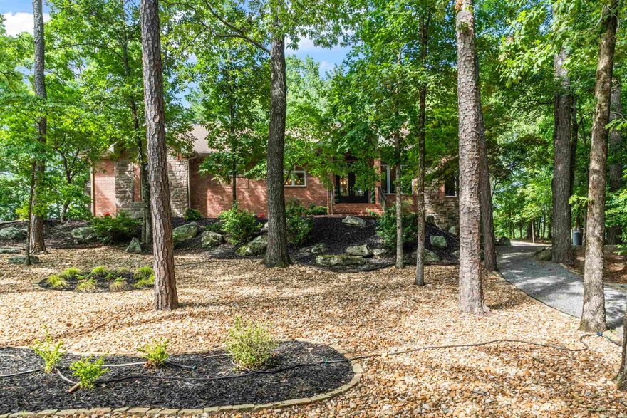 Diamante 6th Green Golf-Front Home – Hot Springs Village, Arkansas  Luxury and lifestyle meet on the 6th Green of Diamante Golf Course, HSV’s only private 18-hole championship course, known for immaculate greens, elevated play, and year-round events and tournaments—an unmatched benefit for avid golfers and social membership living. This stunning, fully updated home welcomes you with 14-foot vaulted tongue-and-groove ceilings, creating warmth, texture, and architectural wow-factor the moment you step inside.  The completely renovated kitchen is the heart of the home, featuring quartz countertops, a farmhouse sink, center prep island, and an oversized bar with seating, ideal for entertaining or everyday gathering. Designed for both function and style, the layout flows seamlessly to outdoor living spaces including a huge covered back porch and an additional Trex deck for grilling, perfect for hosting, relaxing with fairway views, or enjoying sunset nights in privacy.  Diamante membership amenities include world-class golf, clubhouse dining, tennis, pickleball, pools, and vibrant social activities. Hot Springs Village offers 9 golf courses, 11 recreational lakes, marinas, beaches, kaya