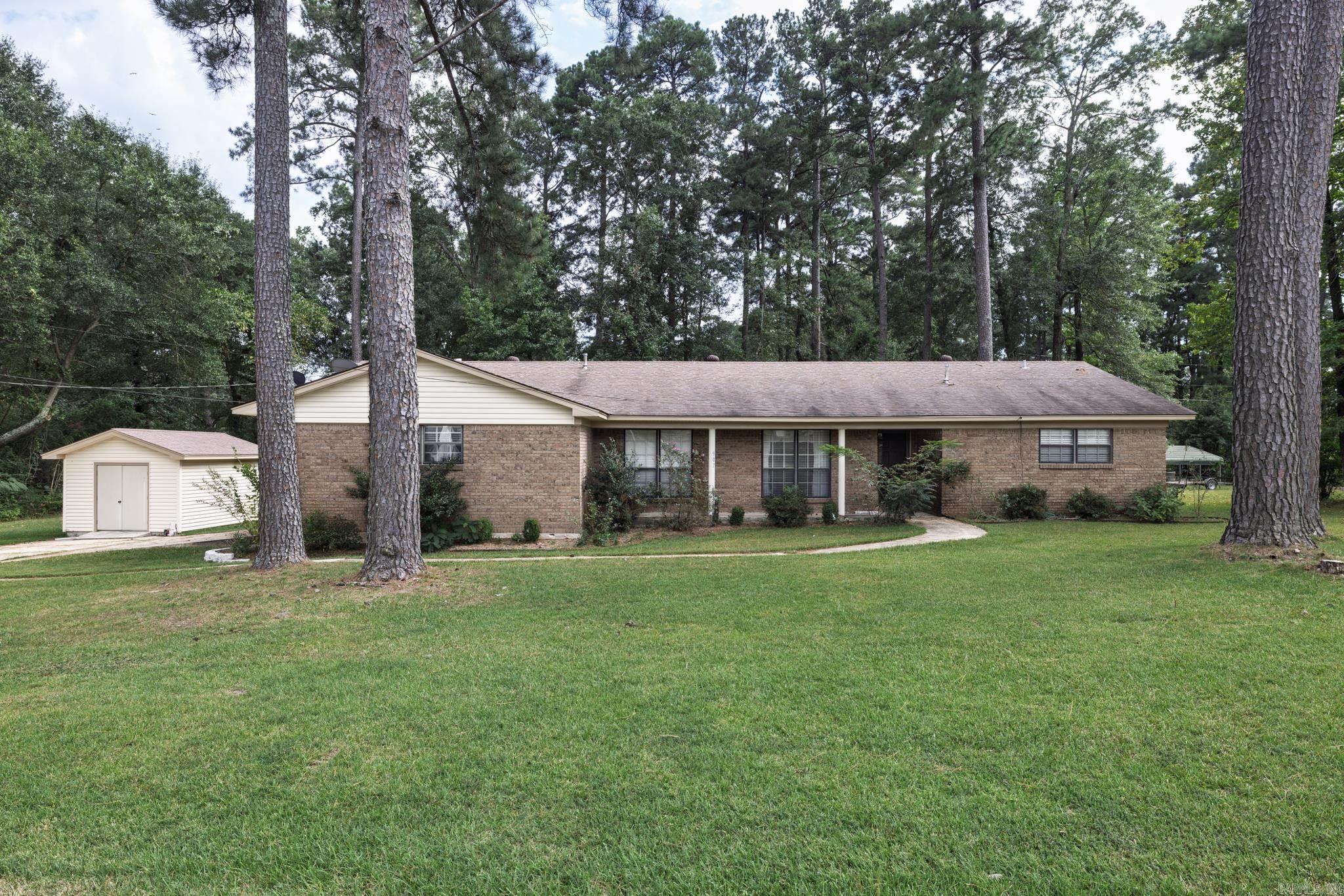 This beautiful brick home offers nearly 3,000 sq. ft. of comfortable living space, perfectly situated on a spacious 0.60-acre lot at the end of a quiet dead-end road within the Hope city limits. Designed with a desirable split floor plan, it features 3 bedrooms and 3 bathrooms, along with a formal dining room for special gatherings, a breakfast area with bar seating for casual meals, and a generous living room with custom built-in shelving and a cozy gas fireplace. An inviting foyer sets the tone upon entry, while the dedicated office, large pantry, and thoughtfully designed layout add both convenience and function. The highlight of the home is the private sunroom off the primary suite, offering a quiet retreat to relax and unwind in comfort. Don't miss out on your chance to own this home.