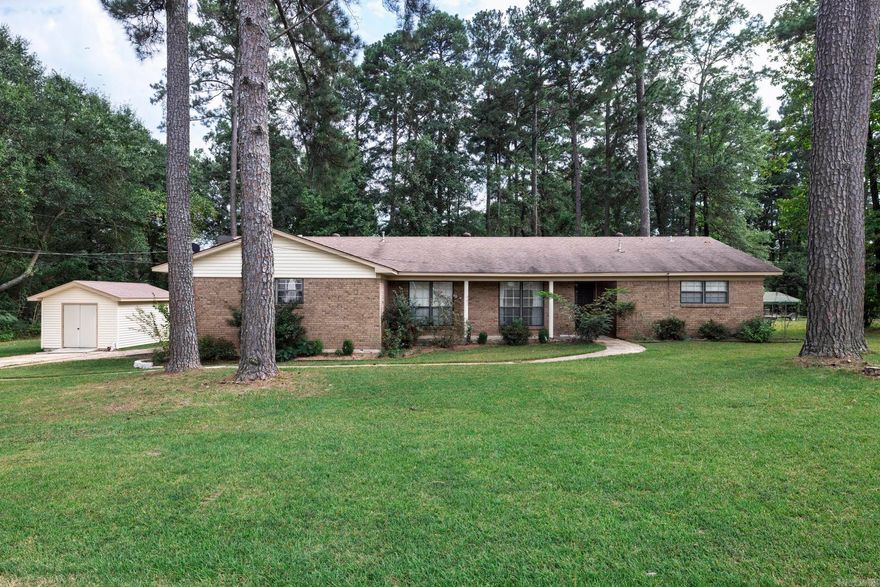 This beautiful brick home offers nearly 3,000 sq. ft. of comfortable living space, perfectly situated on a spacious 0.60-acre lot at the end of a quiet dead-end road within the Hope city limits. Designed with a desirable split floor plan, it features 3 bedrooms and 3 bathrooms, along with a formal dining room for special gatherings, a breakfast area with bar seating for casual meals, and a generous living room with custom built-in shelving and a cozy gas fireplace. An inviting foyer sets the tone upon entry, while the dedicated office, large pantry, and thoughtfully designed layout add both convenience and function. The highlight of the home is the private sunroom off the primary suite, offering a quiet retreat to relax and unwind in comfort.  Don't miss out on your chance to own this home.