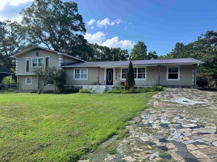 This home has it all! This 5 bed, 2.5 bath, 2800 square foot home is located in Lake Hamilton School District and just minutes to Hot Springs. Main level of the home offers a living room, designated dining room, sizable kitchen, breakfast nook, 2 bedrooms and full bathroom. Off the dining room, the home offers a mud room, laundry area, and half bath. Upstairs would make the perfect master suite with a little ingenuity! Downstairs would be great for a game room or extra bedroom with a living space. Also, new metal roof installed in 2023. With a little love and TLC, this home would be perfect for first time homebuyers or investors looking to add to their portfolio. It's priced ready to sell, so get your private showing in now!