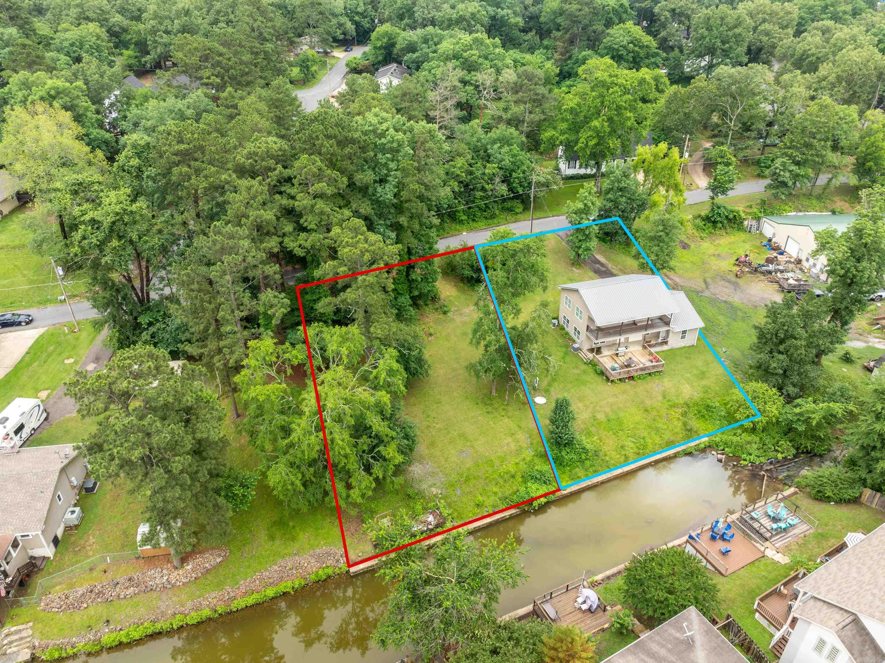 LAKE LOT ONLY. APPROXIMATELY 75 FT OF LAKE FRONT. TO BE DETERMINED BY NEW SURVEY. RED LINES IN PICTURES ARE APPROXIMATE REPRESENTATION ONLY. WATER AND SEWER AVAILABLE AT THE STREET. LOT 61 WITH HOUSE IS ALSO LISTED AND CAN BE PURCHASED. ADDRESS IS 119 PHADRAL PT HOT SPRINGS, AR 71913