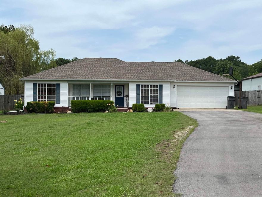 Beautifully built 3 bedroom 2 bathroom home on slab, sitting on a large 1.1 acre lot. Additional shop building on property. Front is lined with a white picket fence. Back yard also offers a privacy fence.