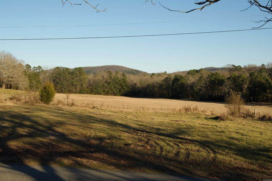 Discover 30 acres of beautiful, fully fenced pasture land on S Pearcy Rd in Pearcy, Arkansas. This prime piece of property offers the perfect blend of open space, privacy, and natural beauty, complete with a pond and picturesque views in every direction.  Ideal for cattlemen seeking quality pasture, buyers looking to establish a regenerative farm, hunters wanting room to roam, or luxury home builders searching for the perfect backdrop to a custom estate, this property provides endless possibilities. The wide-open acreage allows space for livestock rotation, food plots, trails, or a thoughtfully designed dream home set well off the road for privacy and serenity.  Located in a desirable area of Pearcy, land of this quality and size does not come available often. Whether you’re expanding an operation, creating a private retreat, or building a legacy property in Arkansas, this 30-acre tract is a rare opportunity to own prime ground in a peaceful setting