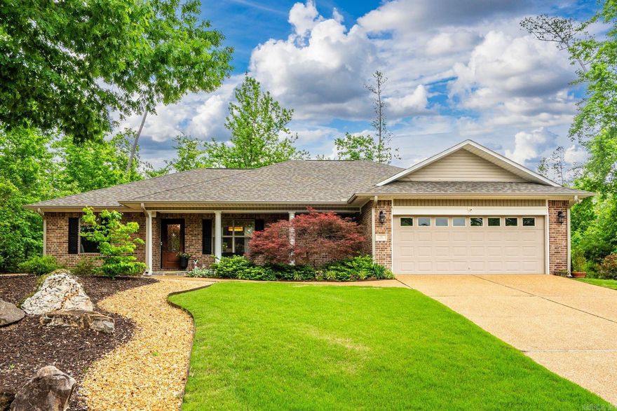 Welcome home to this beautifully appointed one-level, 3-bedroom, 2-bath residence nestled on the west side of Hot Springs Village. Thoughtfully remodeled in 2022, this home blends refined finishes with modern peace of mind, including a new roof and HVAC installed in 2024.  At the heart of the home, the chef’s kitchen is designed to impress with a generous center island, abundant cabinetry, and seamless flow into the main living area—ideal for both entertaining and everyday living. The living space is enhanced by a vaulted ceiling, creating an airy, open ambiance filled with natural light.  The primary suite serves as a private retreat, featuring a tray ceiling, spacious layout, and a well-appointed en suite bath designed for comfort and relaxation. Step outside to enjoy the fully fenced backyard, complete with a covered patio perfect for outdoor dining or quiet evenings. Thoughtful landscaping adds curb appeal both front and back, while the 2-car garage offers ample parking and storage. Conveniently located with easy access through the Glazier Peau gate, this move-in-ready home delivers comfort, style, and convenience in a peaceful Village setting—ready for its next owner to enjoy.