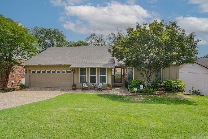 Fabulous house in the Overlook neighborhood!  4 bedrooms and 3 full bathrooms.  Primary and guest bedroom on the main level.  Large primary bedroom with walk in closet.  2 bedrooms and an office or workout room on lower level.  Lovely eat in kitchen with granite countertops and two pantries.  Formal living room, formal dining room and cozy den leading to covered deck overlooking park like backyard.  Downstairs has a den with gas log fireplace and wet bar that opens to a large second covered deck with grill in outdoor kitchen.   There is an open deck area in the lower backyard with an additional gathering spot- perfect to enjoy sitting around a fire pit.  Backyard storage shed.  Two car garage with lots of storage and built in work bench.  Updates include new roof in 2021 and new LVP flooring in kitchen, living room and den upstairs.  Come see today!