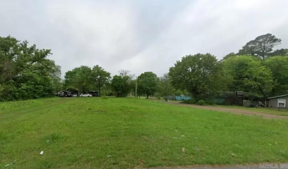 This .32 (+/-) acre lot is clear, flat and ready for you to build a new home. It is close to the Texas border, parks, restaurants and other local amenities. Property conveys with a Limited Warranty Deed. Owner financing available. Mobile homes are not allowed. Call or text today for more information.