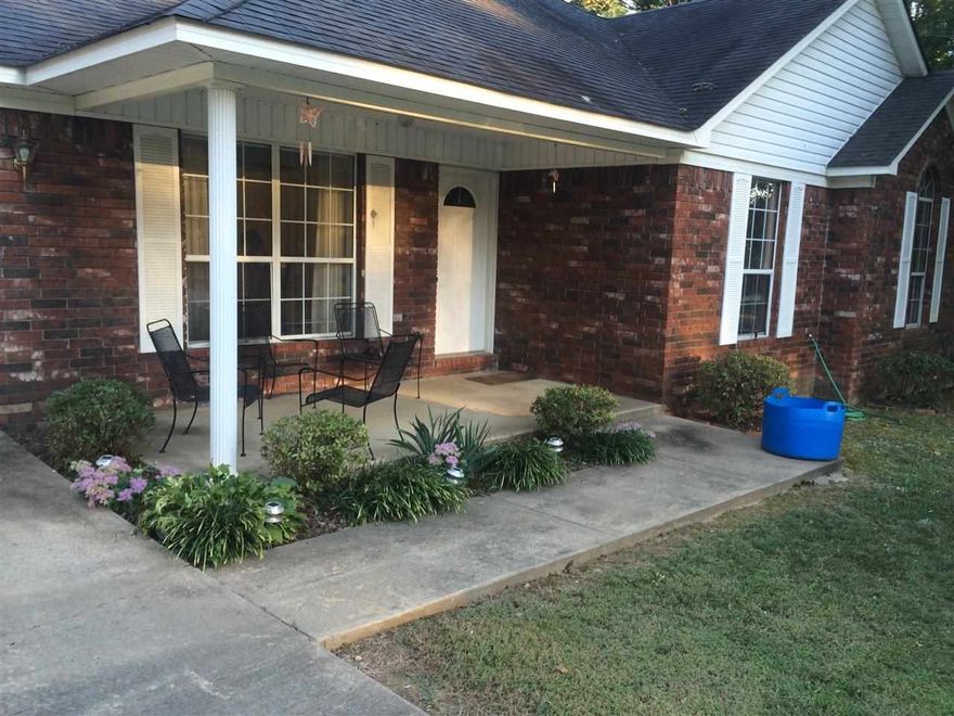 Very nice 3 bed, 2 bath, all brick house  with gas log fire place in living room, formal dining room, large pantry in kitchen and a large wood patio deck all this on beautiful 2 acres with lots of trees in a great neighborhood.