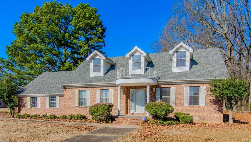 Great location across and slightly west on Mt Carmel Road from Rolling Hills Country Club.  Three bedroom, three bath home on approximately 2 acres.  Den fireplace, formal living and dining.  Eat-in kitchen.  16x16 sunroom.  Two car garage with tornado shelter.  Large deck, R/V parking and storage shed.  Plumbing has been updated with PECS and New architectural roof within last two years, downstairs walk in shower recently added.  From your front yard you can hear the swing/ping off the 16th hole.  Please see confidential remarks.