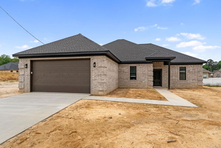 **$10K buyer credit—use it your way!** Move-in ready new construction in Springtree Village Phase 5, a soon-to-be gated community just minutes from town. Features include granite countertops, tray ceilings, recessed lighting, electric fireplace, ceiling fans, and architectural shingles. Finished garage with opener. Cul-de-sac lot in a growing neighborhood planned for gated access. 1-year builder warranty included. Lot dimensions and acreage estimated from plat map—buyers to verify. Square footage per plans—buyers to measure. Taxes TBD. Some photos show virtual furnishings. No seller property disclosure.