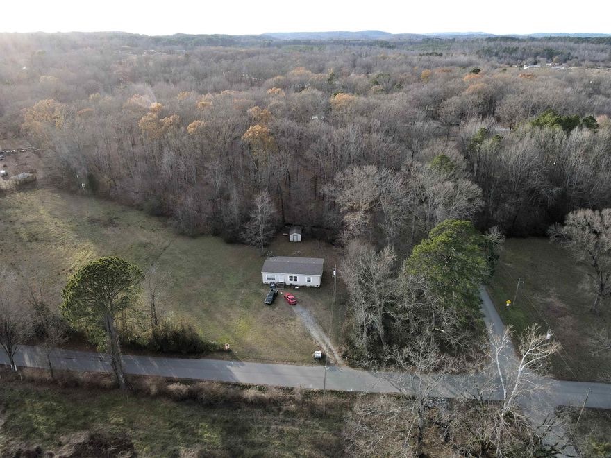 - 4 +/- acres of timber - 2 +/- acres of pasture - All weather creek - Mature hardwood mix - Utilities on the property - 1456 sq. ft mobile home - Abundant wildlife - Paved road frontage on 2 sides - 15 miles to Hot Springs - 12 miles to Benton