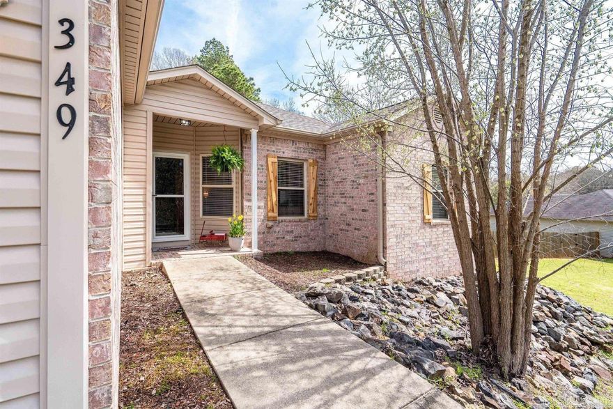 This home is nestled on a quiet no thru street in a well established neighborhood. A local artisan has added his touches with custom barn doors, a built in bookcase and board and batten shutters. The lot across the street is a gated estate and the lot behind is owned by the next door neighbors who cleared out the brush and put up a privacy fence. There is an empty lot next door, not for sale. If you are looking for a quaint bungalow in a quiet spot this could be your home. Listen to the geese fly over at dawn and dusk. A new water filter has been been installed. The entire house and garage have just been painted a warm neutral color. A plug over the fireplace has been put in place for your TV viewing. Fridge conveys and the seller will gift a home warranty to the buyers. There is a spacious fenced in backyard with a small dog door for your fur babies. A wood burning fireplace for those cold winter nights. Master bath has his and hers vanities and walk in closets. Pocket lights in living room and under counter lighting in the kitchen. Due to a hail storm this home has a brand new roof new siding and new gutters.This home is move in ready.