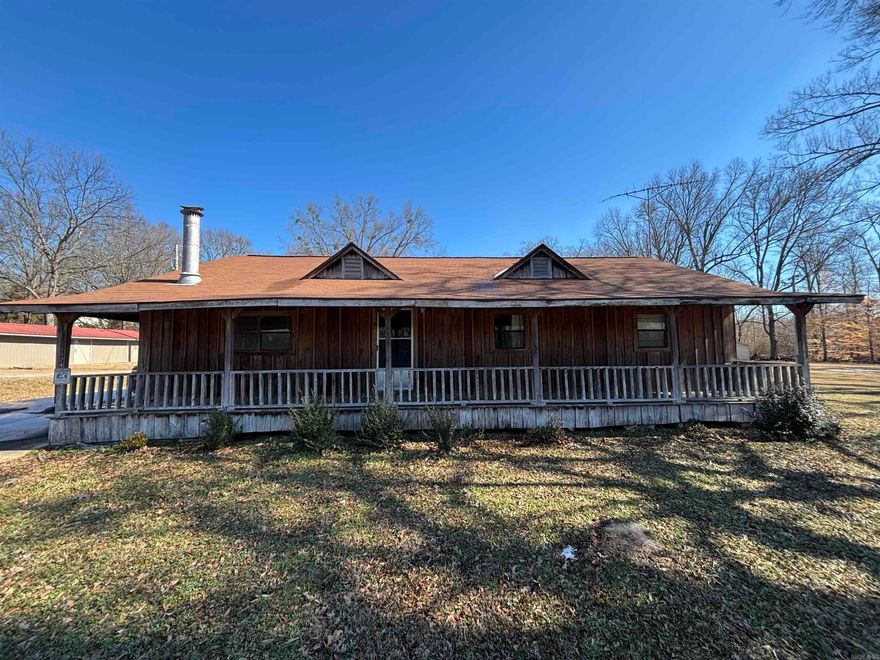Discover rustic charm with this well-maintained 3-bedroom home featuring beautiful cedar siding and a warm, inviting feel throughout. Designed for both everyday living and enjoyment, the property offers plenty of parking and multiple covered outdoor areas—perfect for entertaining, hobbies, or simply relaxing outdoors. The flat, fully fenced backyard provides space for kids, pets, or gatherings, while the peaceful edge-of-town location delivers quiet living with the convenience of nearby city amenities. Move-in ready and waiting to welcome its next family.