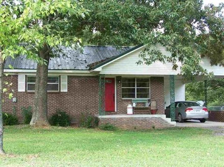 Great location near downtown Clinton..Updated kit. w/stainless steel appl...tile floor and back splash..new counters & sink....HVAC & HW heater appx. 7yrs old..tile in kitchen,laundry/office..new tile surround & sink in hall bath..master bath has  vanity/sink & large closet..walk-in shower.. all tastefully done...large fully fenced level backyard with storage bld..covered patio and porch..green space behind home..metal roof...Very nice area...Credit report and references required.. MLS VIOLATION REMOVED