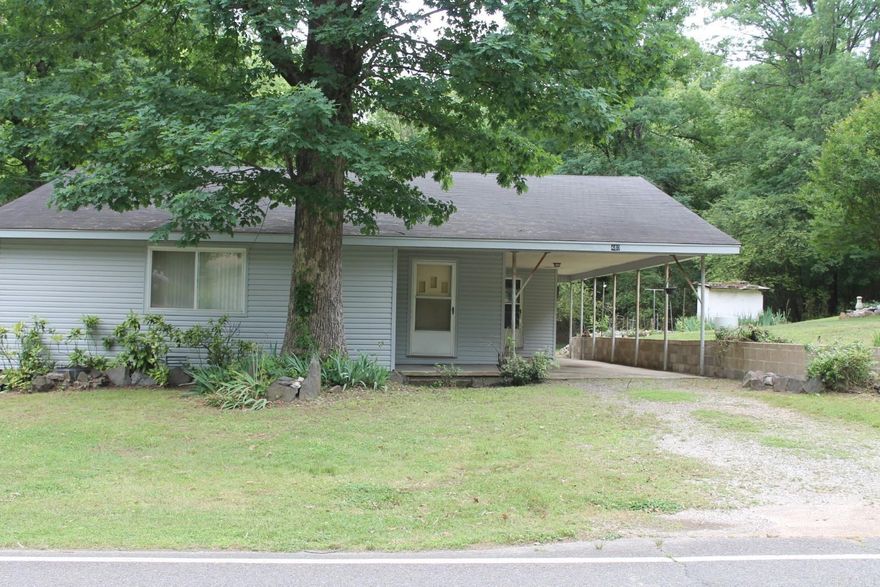 What a find! Approximately 3.4 acres in town right off Central Avenue. Perfect opportunity for development or have a retreat in the center of town. The home and property have been lovingly maintained by one owner.